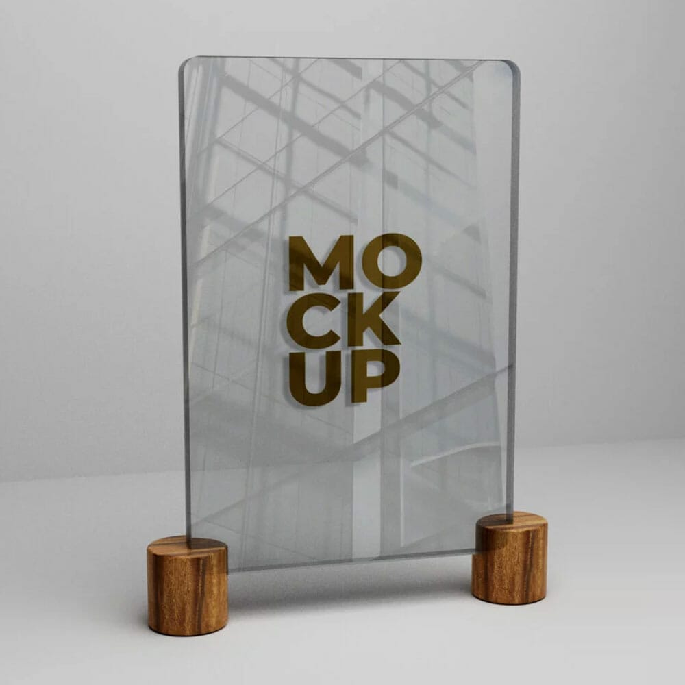 Free Gold Logo Mockup On Glass On Wooden