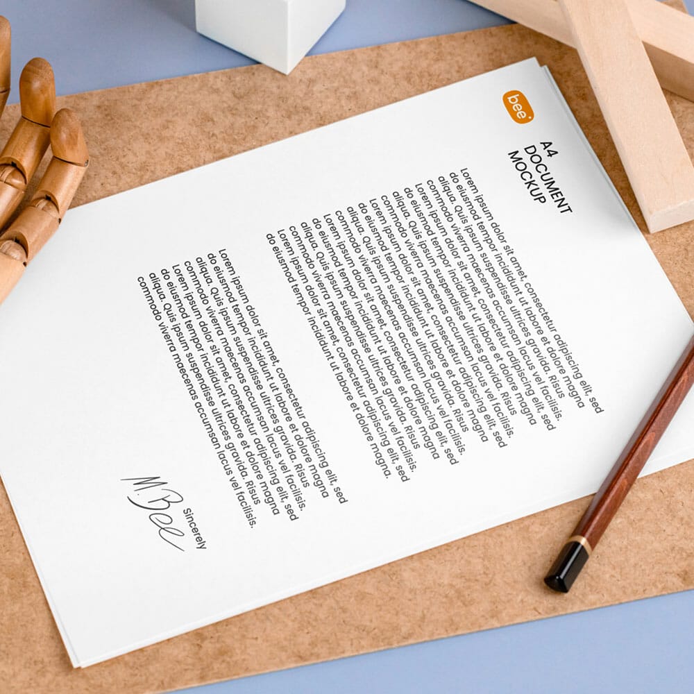 Free Letterhead With Wooden Hand Mockup PSD