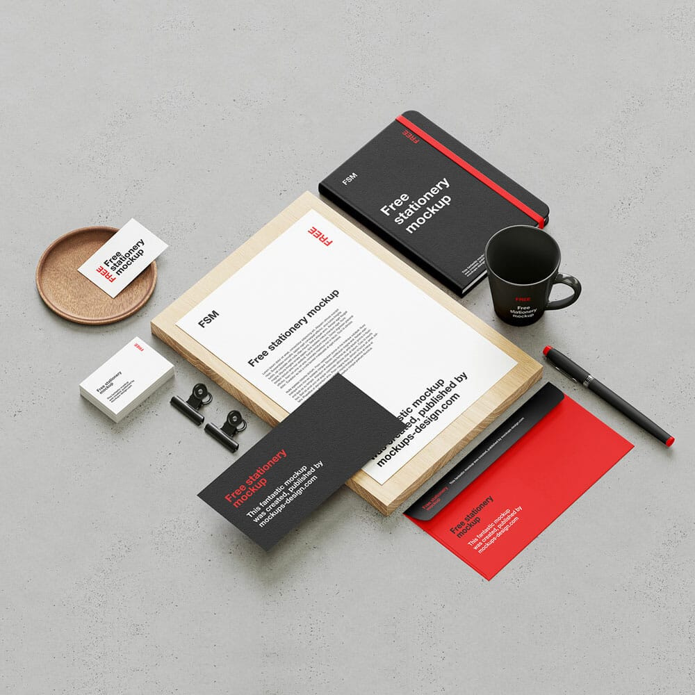 Free Stationery On Concrete Background Mockup PSD