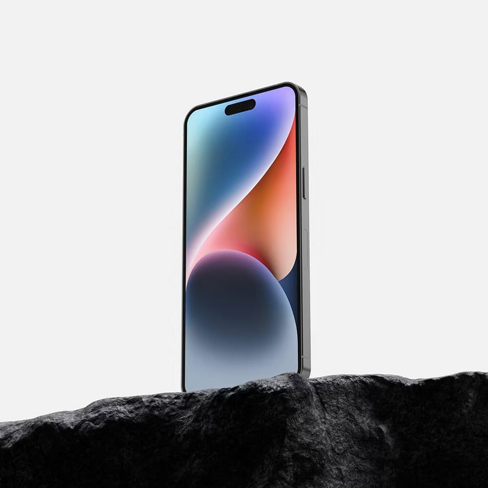 Free iPhone 14 Pro Max On Rock Mockup PSD