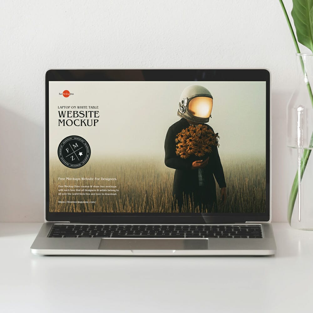 Free Laptop on White Table Website Mockup PSD