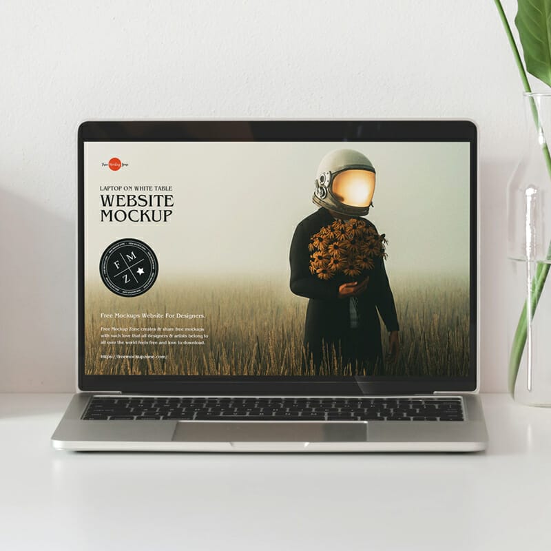 Laptop on White Table Website Mockup PSD