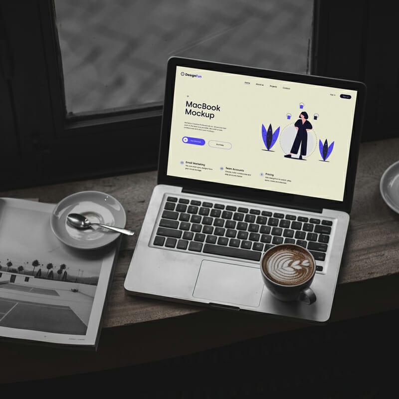 MacBook in Cafe Mockup PSD