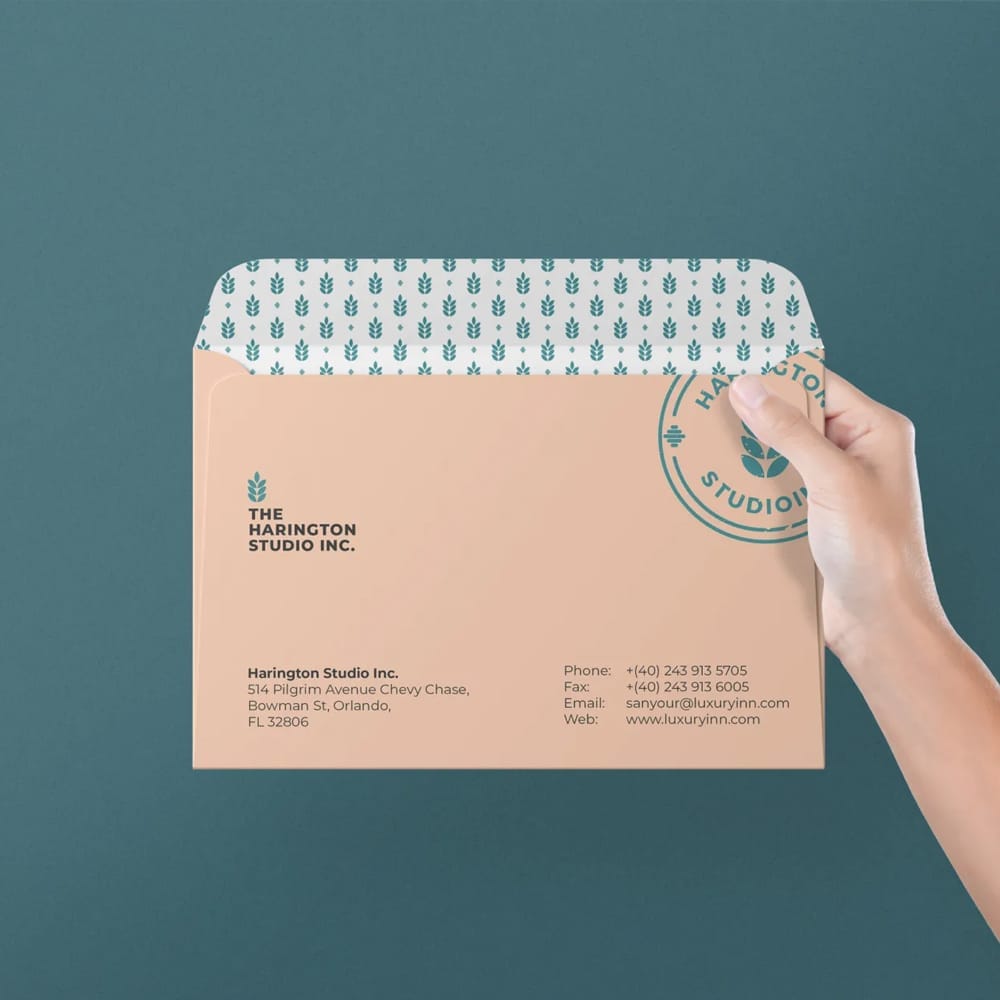 Free Envelope in Hand Mockup PSD