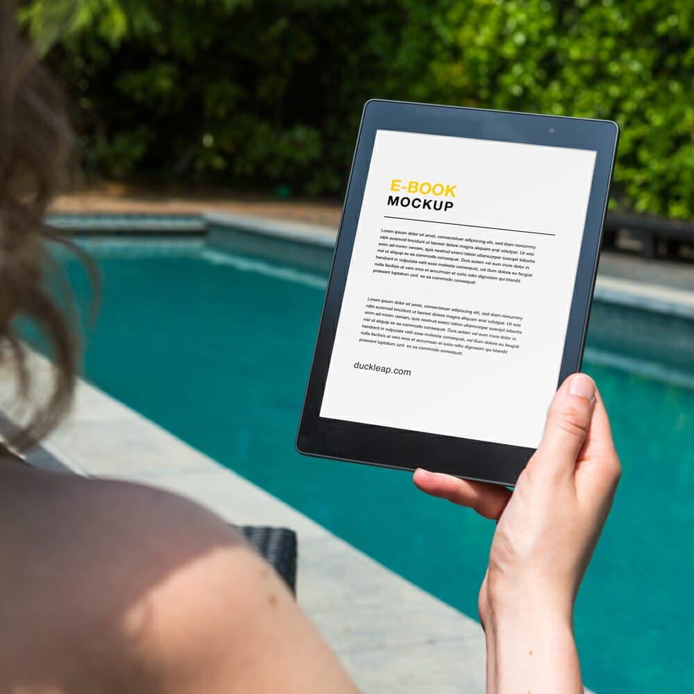 Free eBook in Hand Mockup PSD