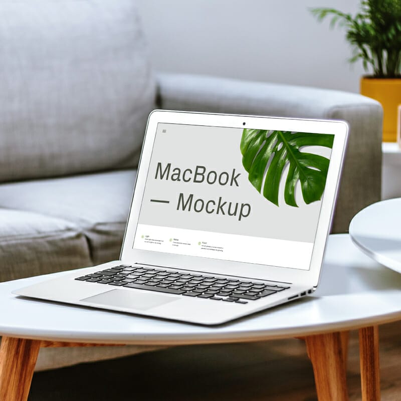 MacBook On Table Mockup PSD