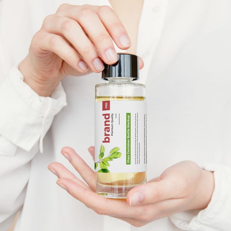 Girl Showing Glass Container Bottle Mockup