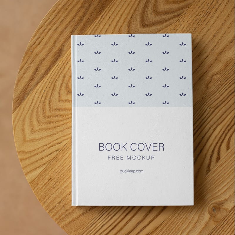 Book on a Wooden Table Mockup PSD