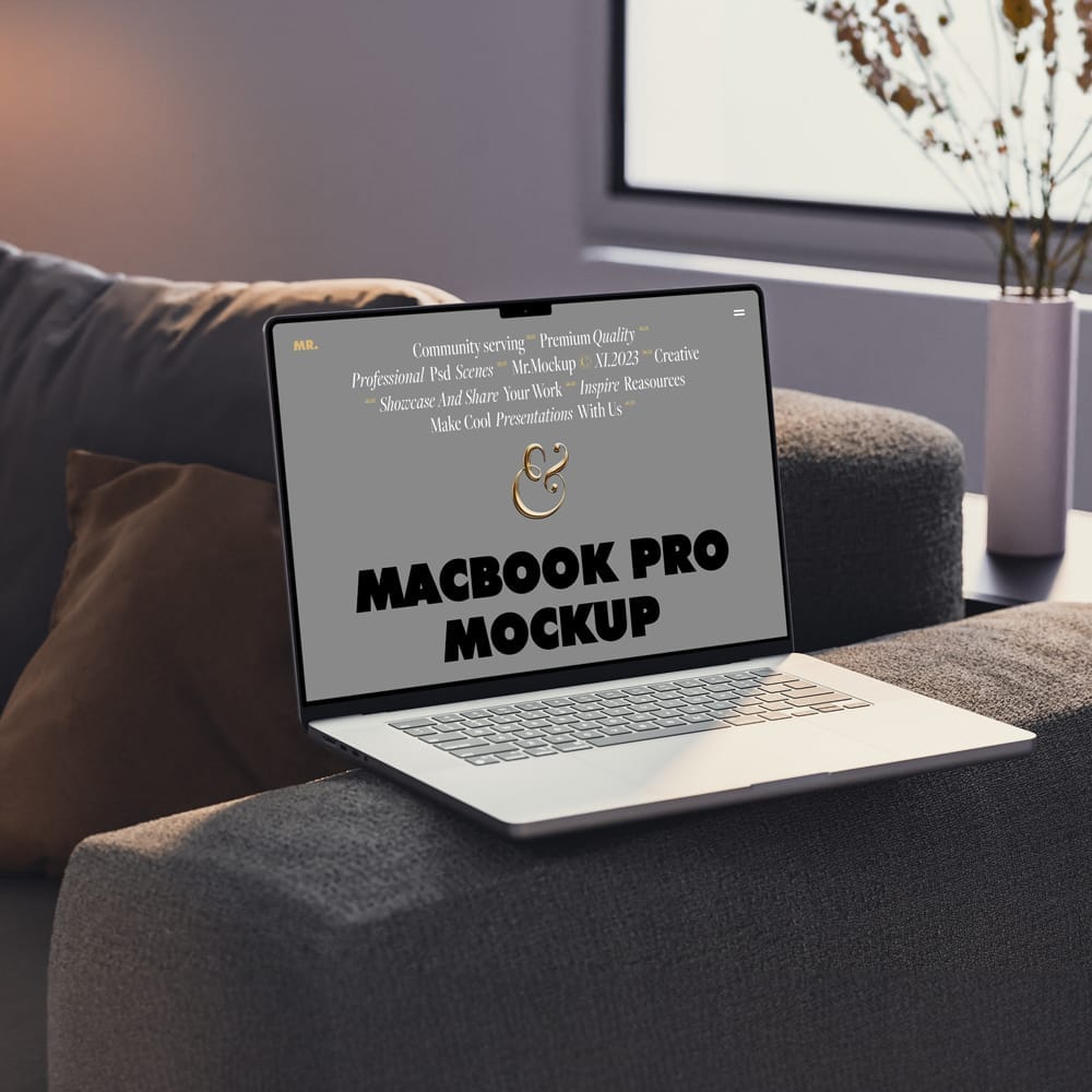Free MacBook Pro on Couch Mockup PSD