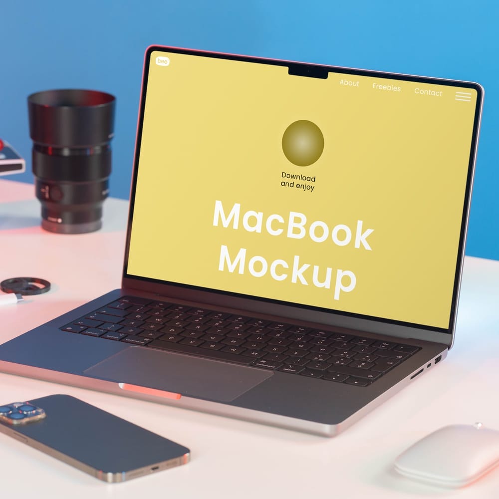 Free MacBook in Studio Mockup PSD