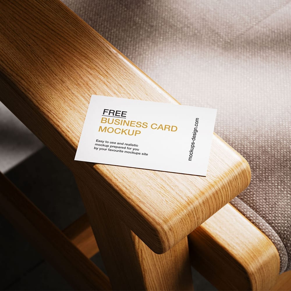 Free Business Card Lying on Armchair Mockup PSD