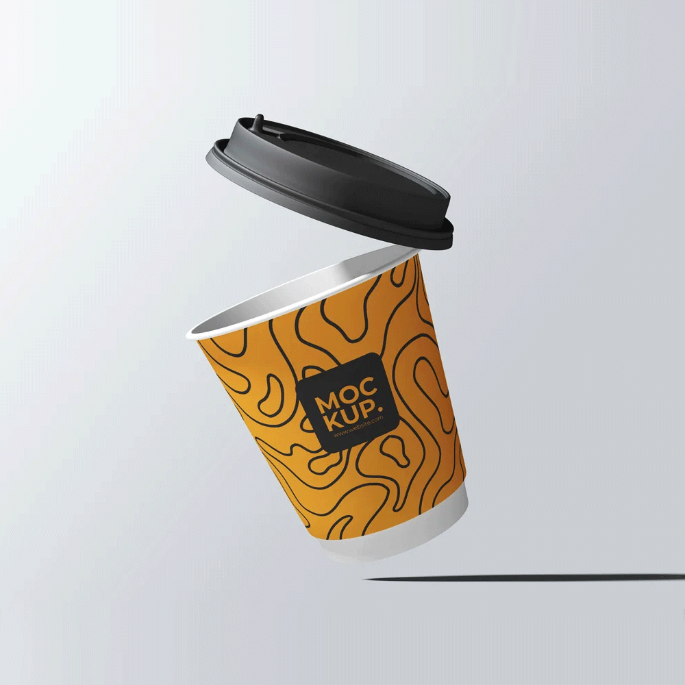 Free Floating Paper Cup Mockup PSD