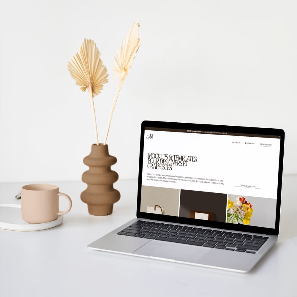 Free Macbook and Colour Vase Mockup PSD