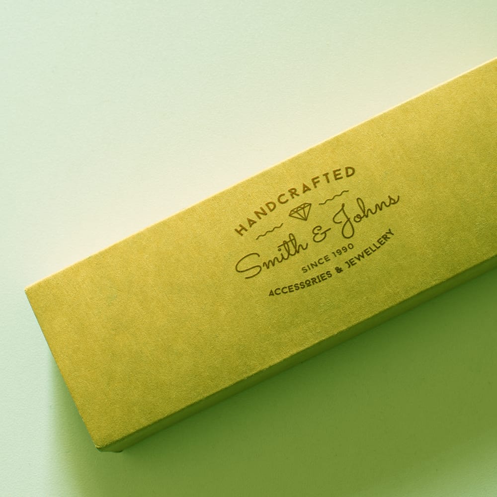 Free Realistic Pencil Box Logo Mockups PSD