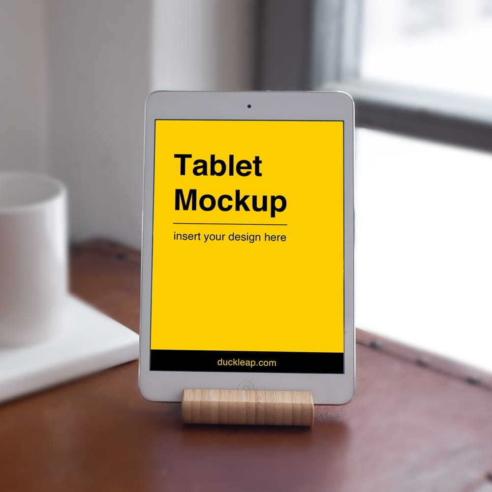 Free iPad on Wooden Stand Mockup PSD