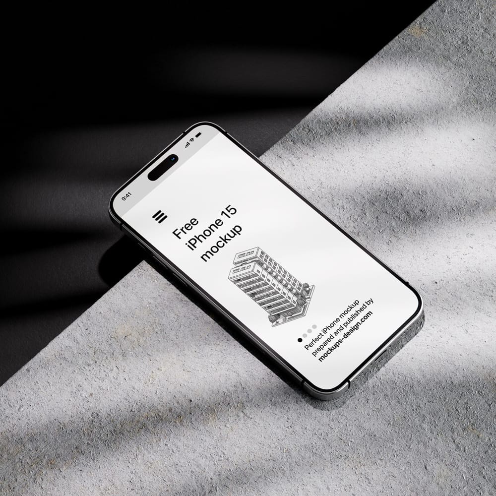 Free iPhone 15 on Dark Background Mockup PSD