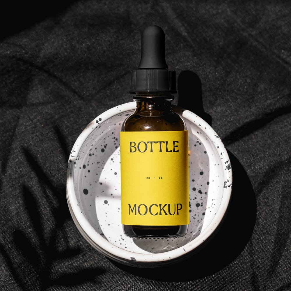 Free Cosmetic Bottle with Label Mockup PSD