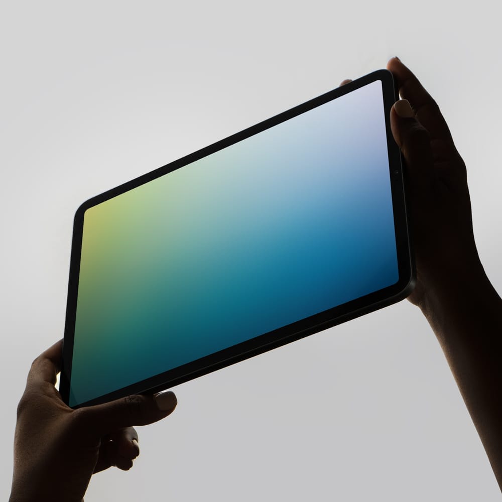 Free iPad Pro in Hands Mockup PSD