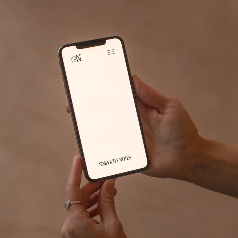 iPhone in Hand Mockup PSD