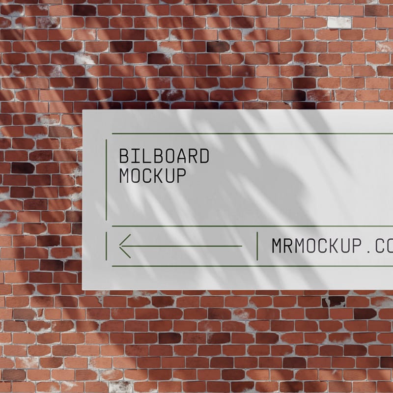 Billboard on Brick Wall Mockup PSD