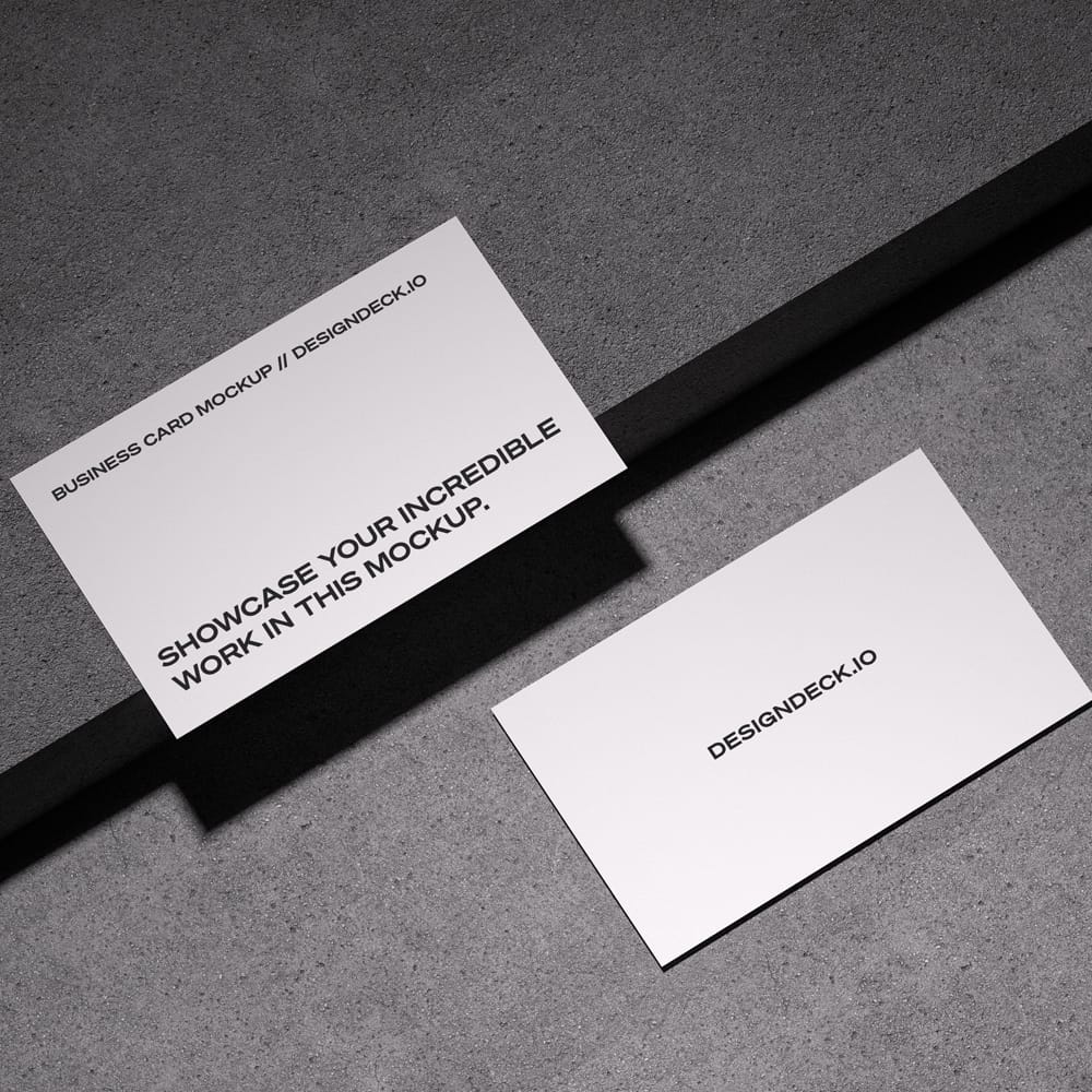 Free Business Cards on Concrete Floor Mockup PSD