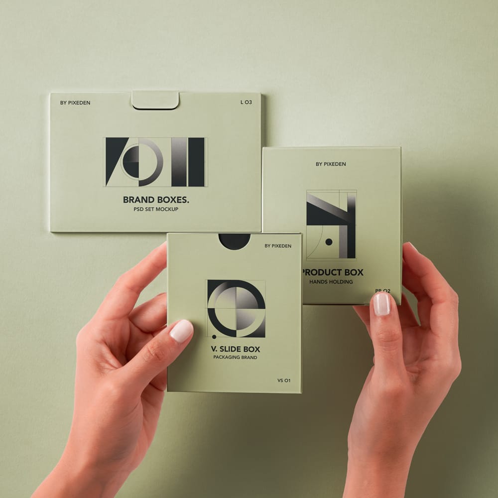 Free Hands Holding Product Boxes Mockup Set PSD