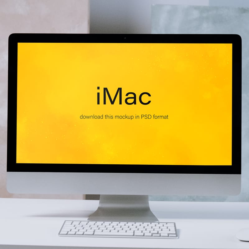 iMac on a White Table Mockup PSD