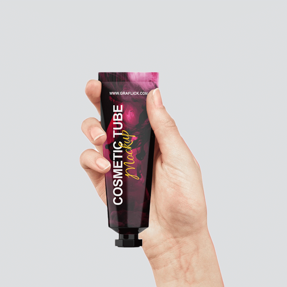 Free Cosmetic Tube in Hand Mockup PSD