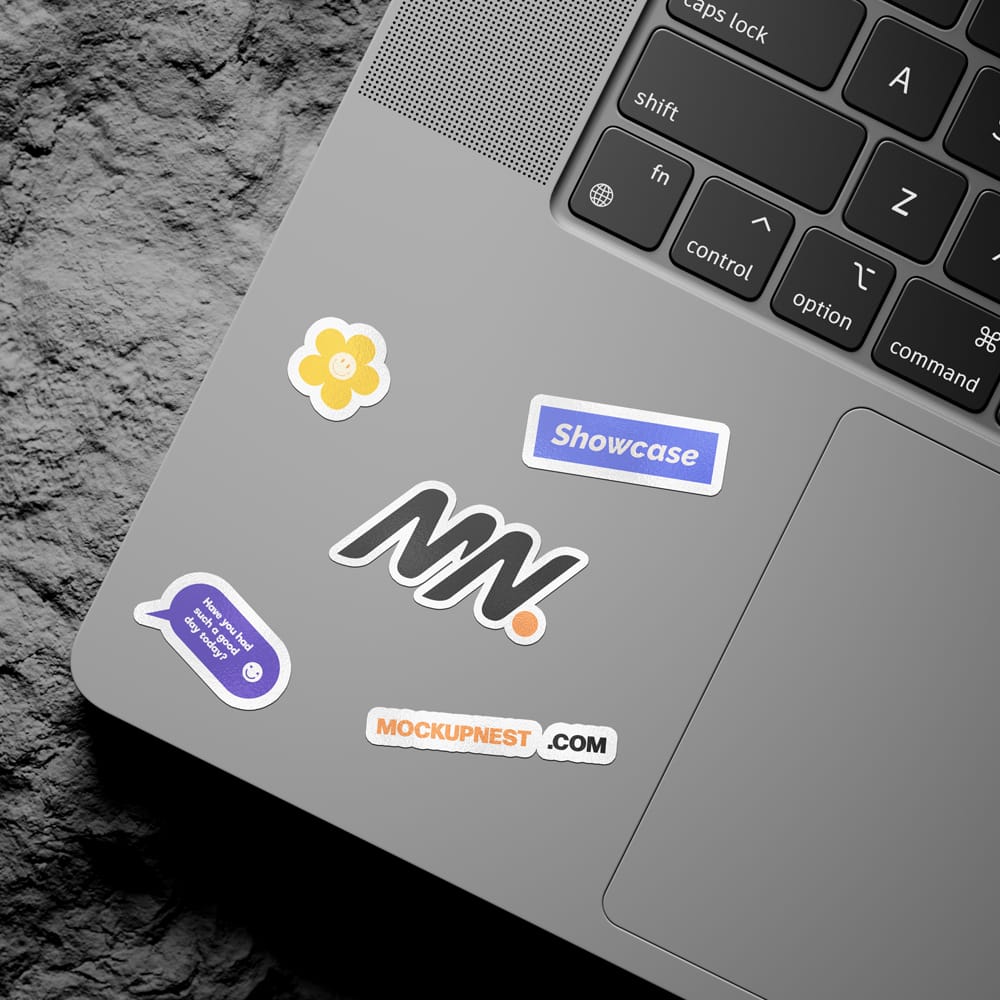 Free Laptop Sticker On Rock Mockup PSD