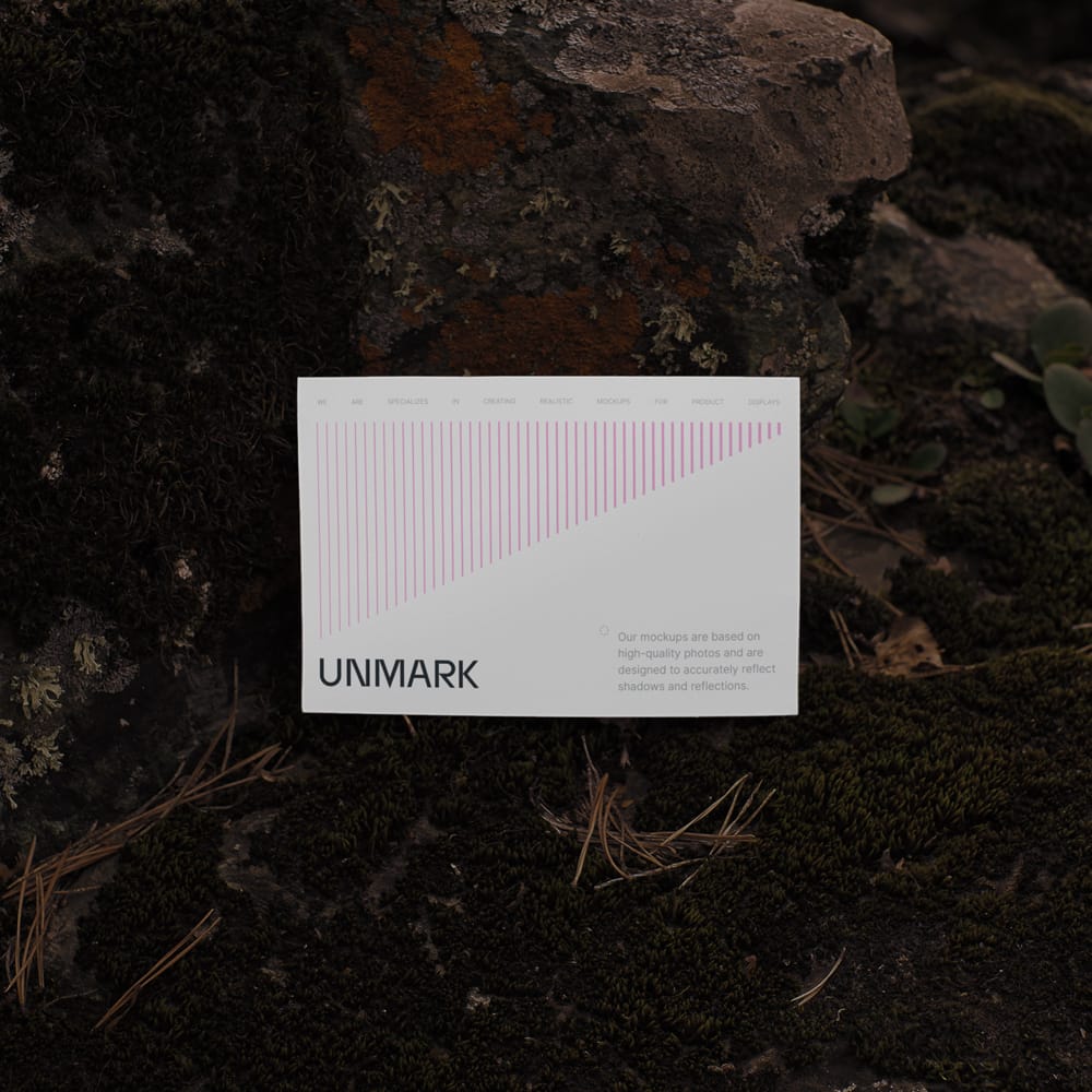 Free Postcard Mockup on Natural Dark Stone PSD