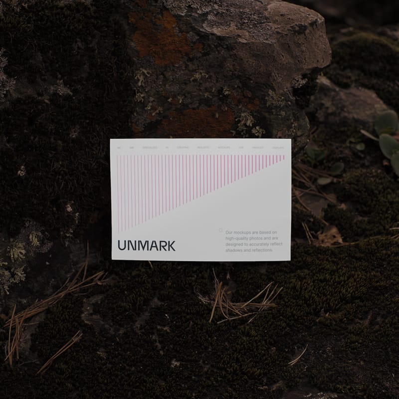 Postcard Mockup on Natural Dark Stone PSD