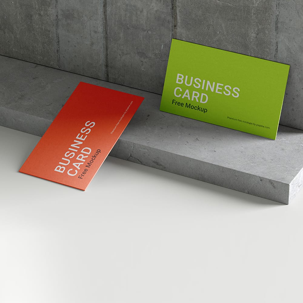 Free Business Card on Textured Wall Mockup PSD