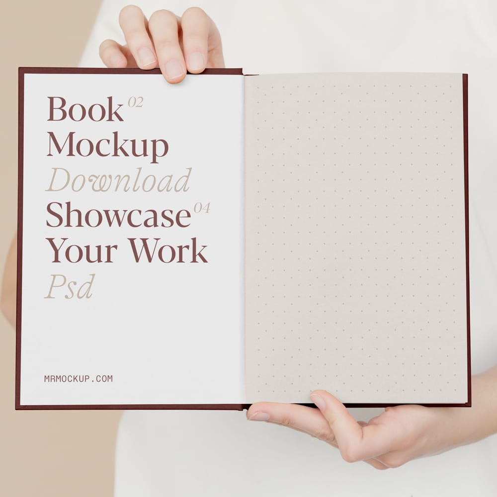 Free Open Book Holding by Man Mockup PSD