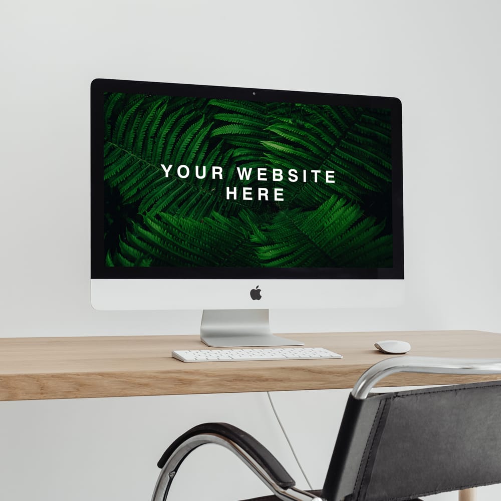 Free iMac Pro on Desk Mockup PSD