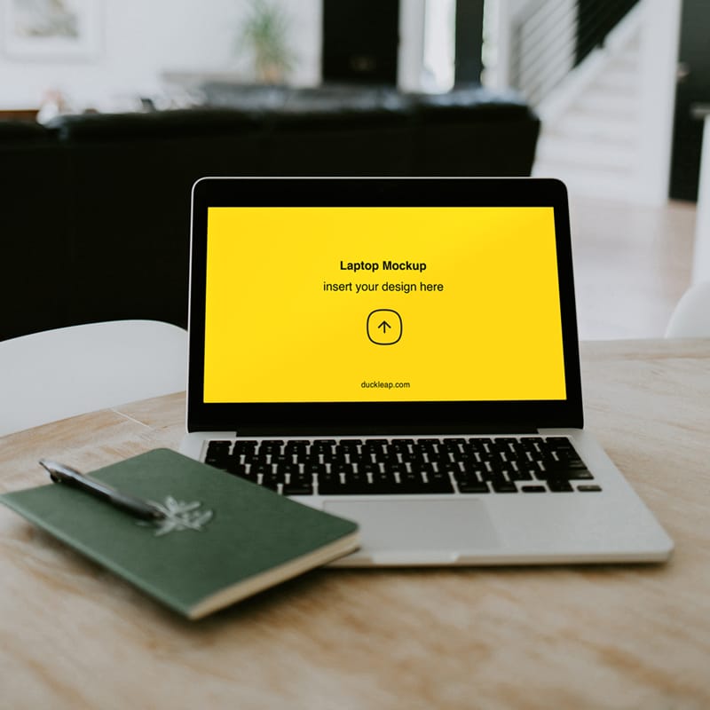 Laptop on the Table Mockup PSD