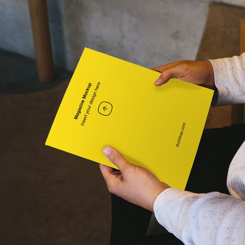 Magazine in Hands Mockup PSD