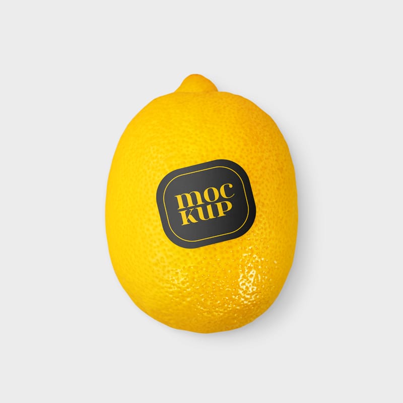Oval PLU Produce Sticker on Lemon Mockup PSD