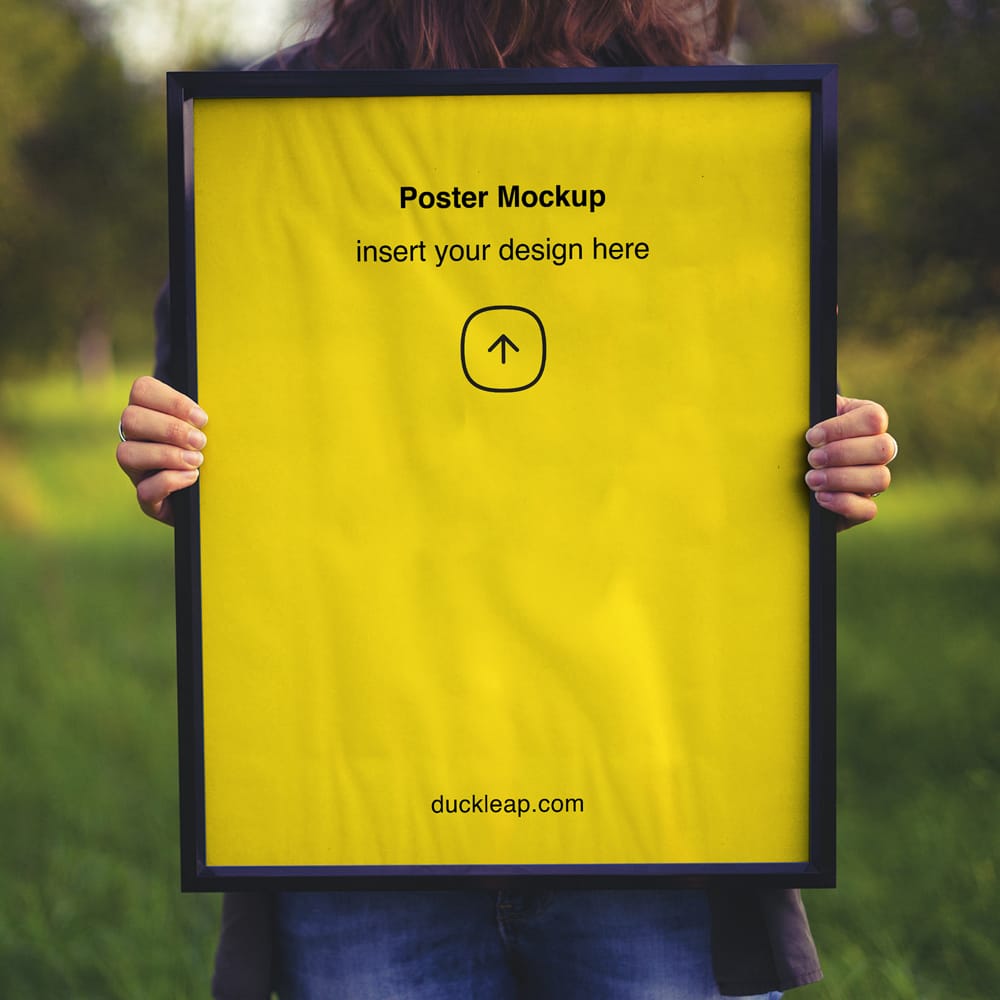 Free Woman Holding Poster Frame Mockup PSD