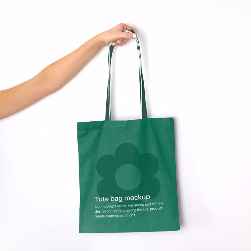 Hand Holding Tote Bag Mockup PSD