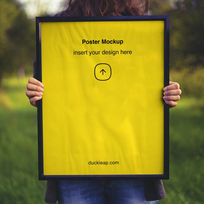 Woman Holding Poster Frame Mockup PSD