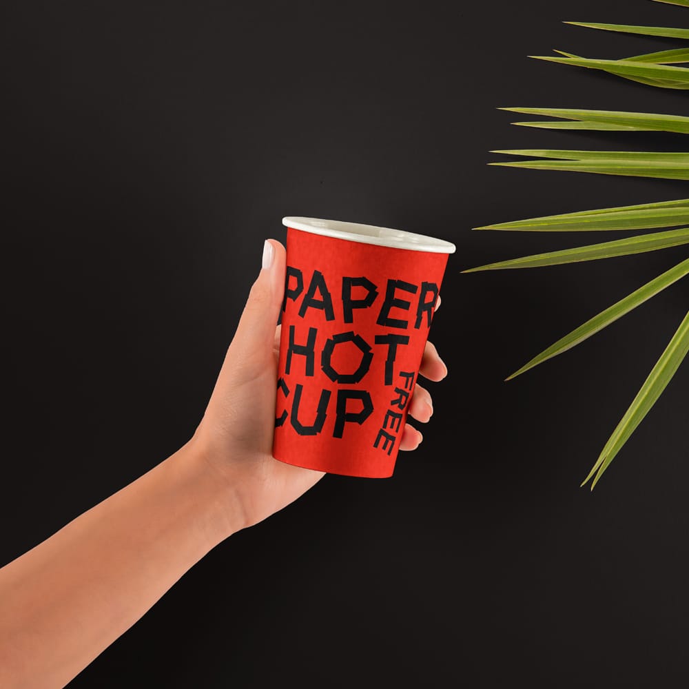 Free Hands Holding Paper Hot Cup Mockup PSD