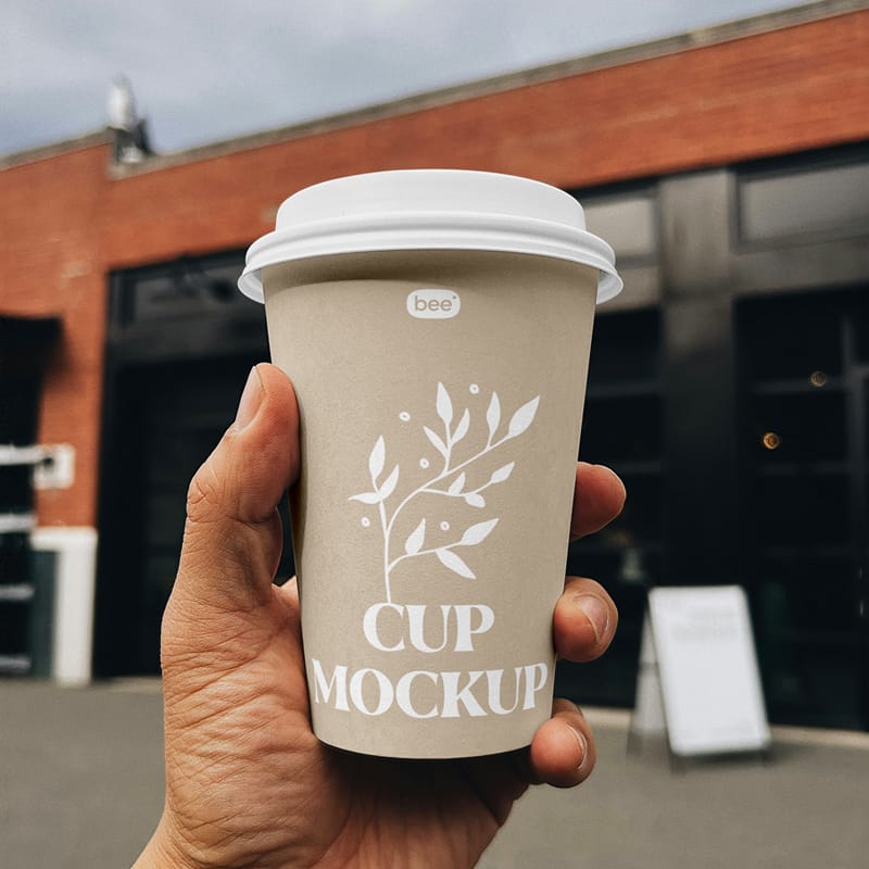 Big Paper Cup in Hand Mockup PSD