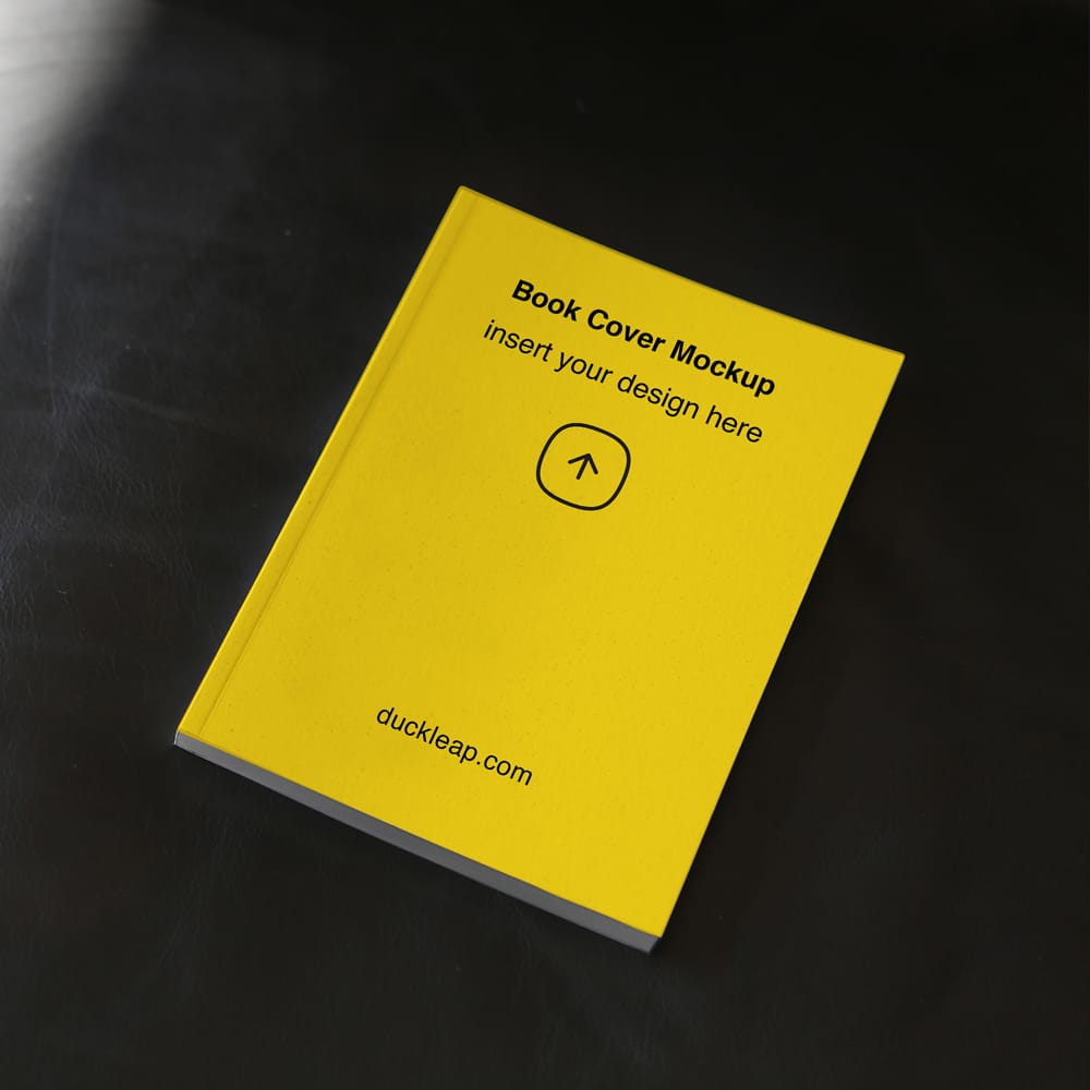 Free Book on Black Leather Mockup PSD