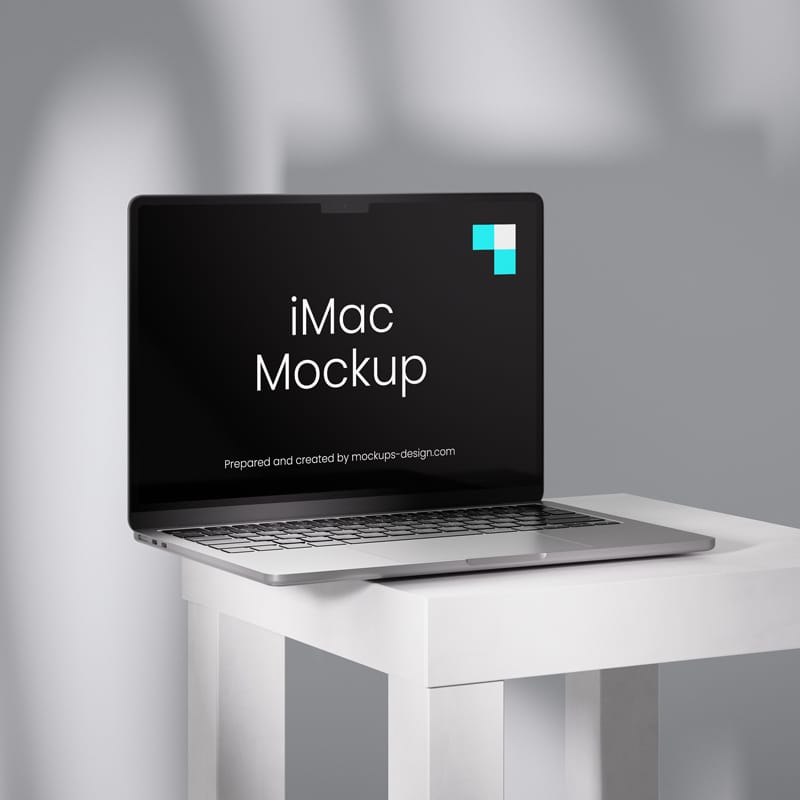 MacBook on a Table Mockup PSD
