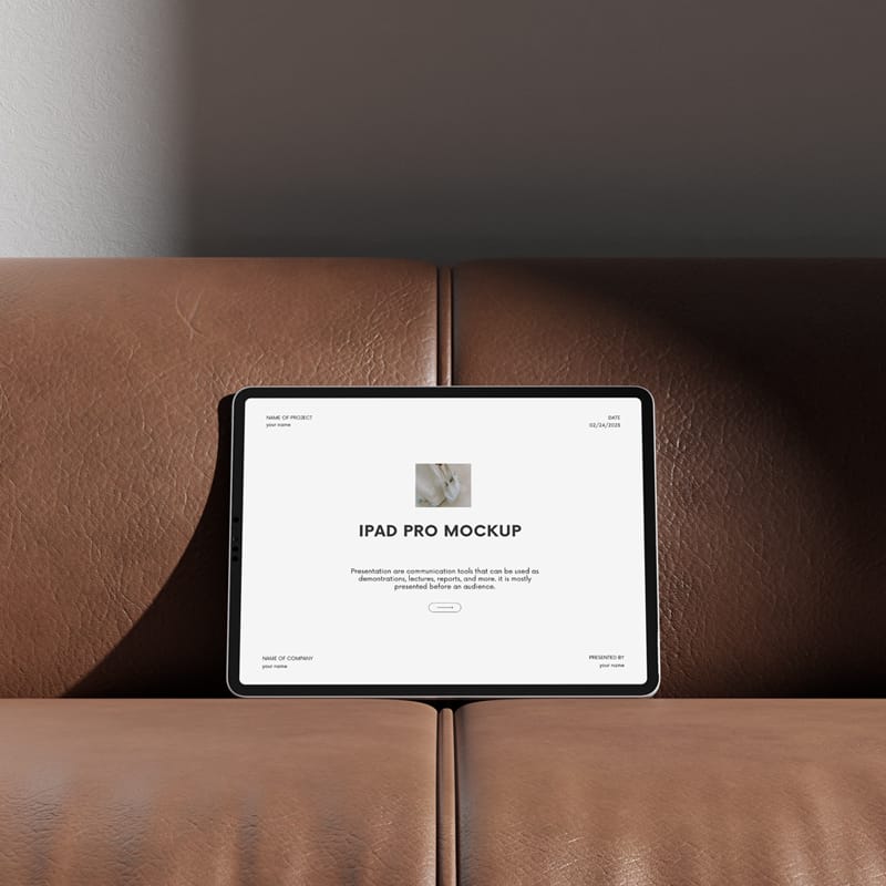iPad Pro on Leather Couch Mockup PSD