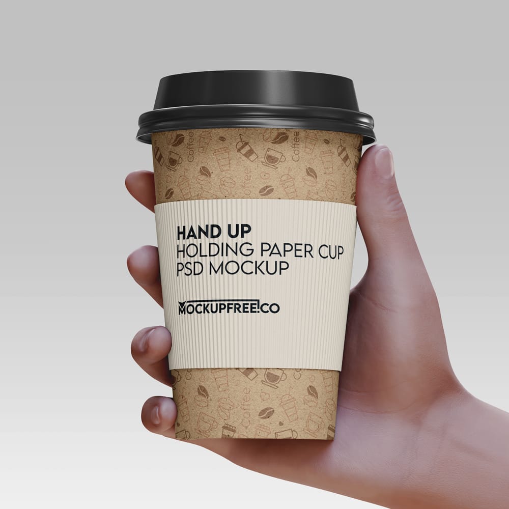 Free Hand Up Holding Paper Cup Mockup PSD