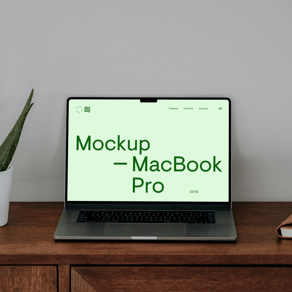 Free MacBook on Dresser Mockup PSD