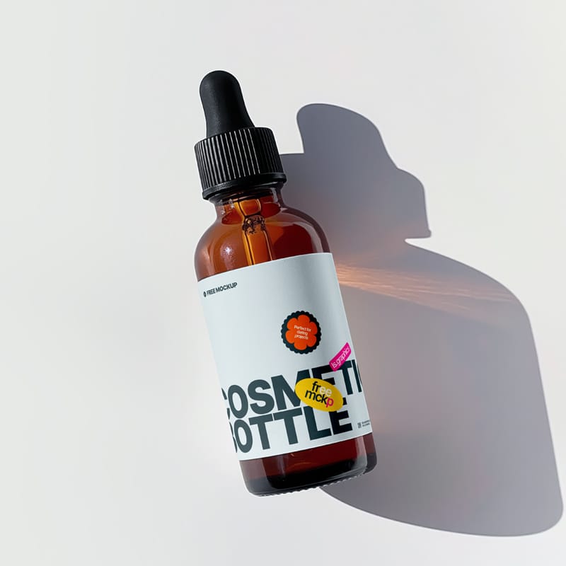 Elegant Glass Dropper Bottle Mockup PSD