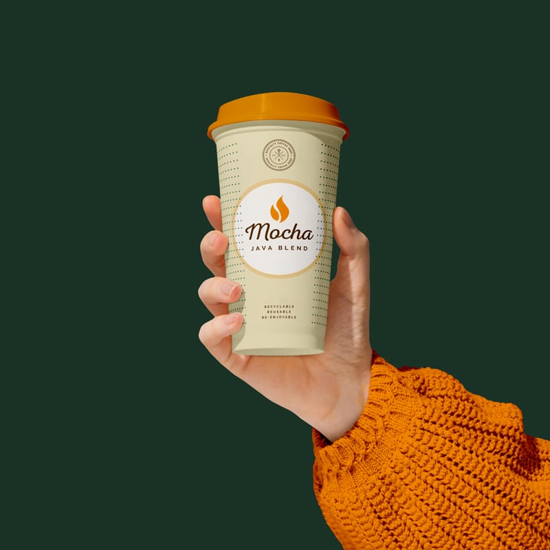 Realistic Hand Holding Coffee Cup Mockup PSD