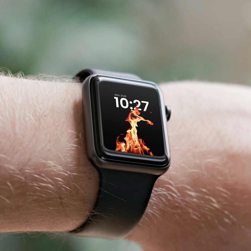 Free Apple Watch on Man Wrist Mockup PSD